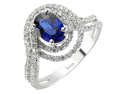 Diamond and oval sapphire ring in 14 carat white gold