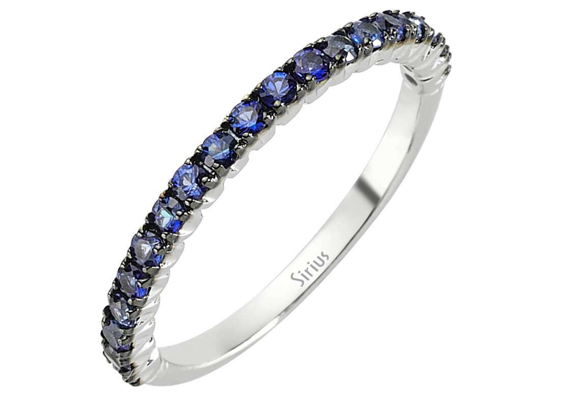 0.50 carat sapphire half-round alliance in 18 K white gold