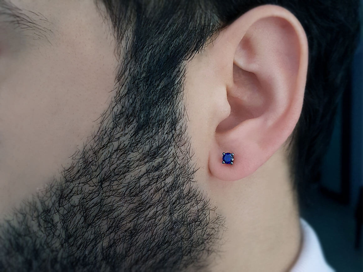 0.30 carat sapphire solitaire men's earring in 14K white gold 