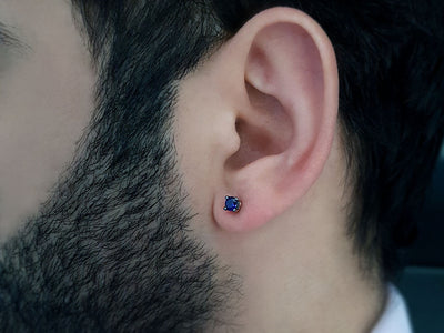 0.30 carat sapphire solitaire men's earring in 14K white gold 