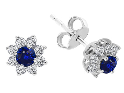 Diamond and sapphire stud earrings in 14 K white gold