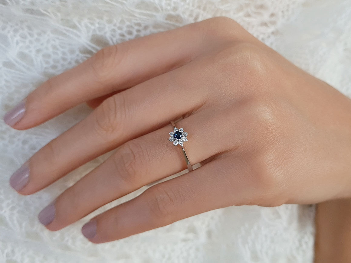 Diamond and sapphire ring in 14 K white gold