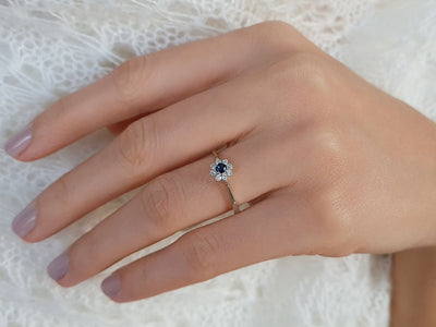 Diamond and sapphire ring in 14 K white gold