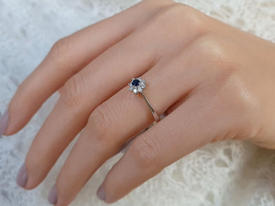 Diamond and sapphire ring in 14 K white gold