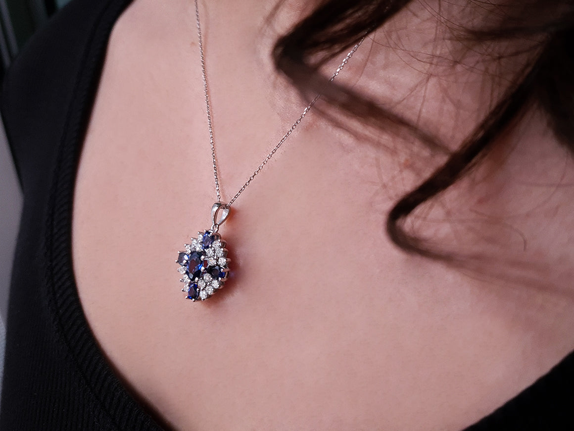 Diamond and sapphire necklace in 14 K white gold