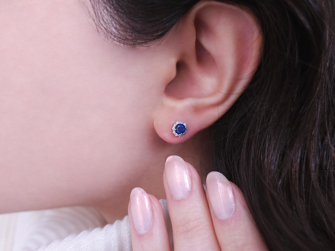 Diamond and sapphire earrings in 14 carat white gold