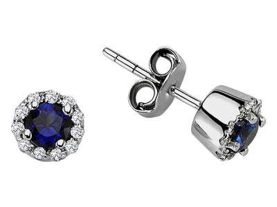 Diamond and sapphire earrings in 14 carat white gold