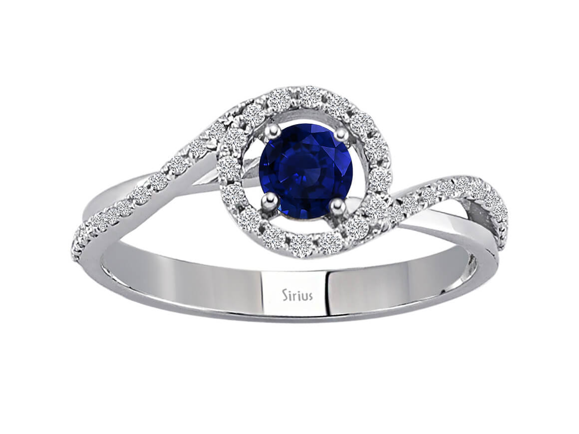 Bague diamant et saphir en or blanc 14 carats