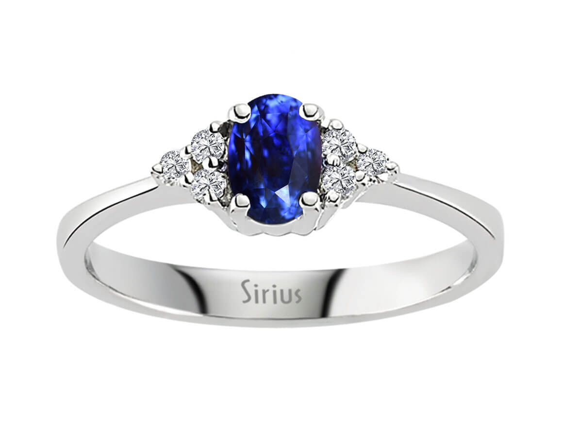 Diamond and oval sapphire ring in 333 8K white gold