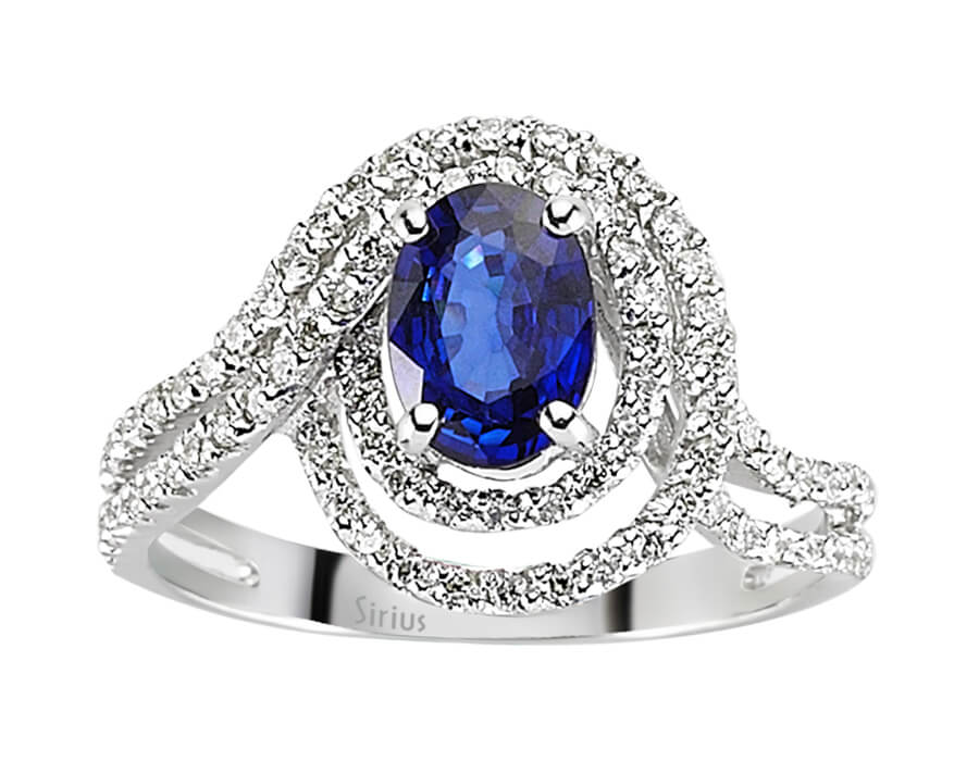 Diamond and oval sapphire ring in 14 carat white gold
