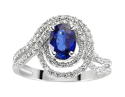 Diamond and oval sapphire ring in 14 carat white gold