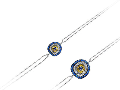 Diamond and sapphire eye motif bracelet in 14K white gold