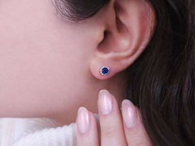 Diamond and sapphire earrings in 14 carat white gold