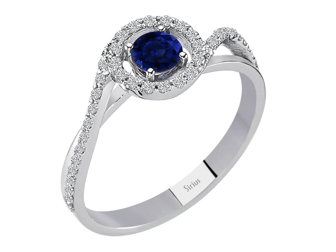 Bague diamant et saphir en or blanc 14 carats