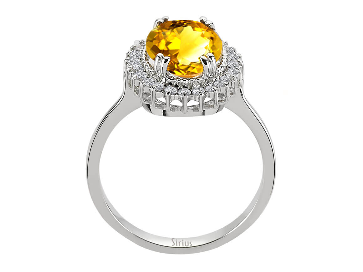 Diamond and oval citrine ring in 14 carat white gold
