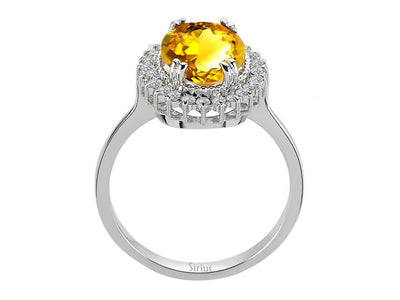 Diamond and oval citrine ring in 14 carat white gold