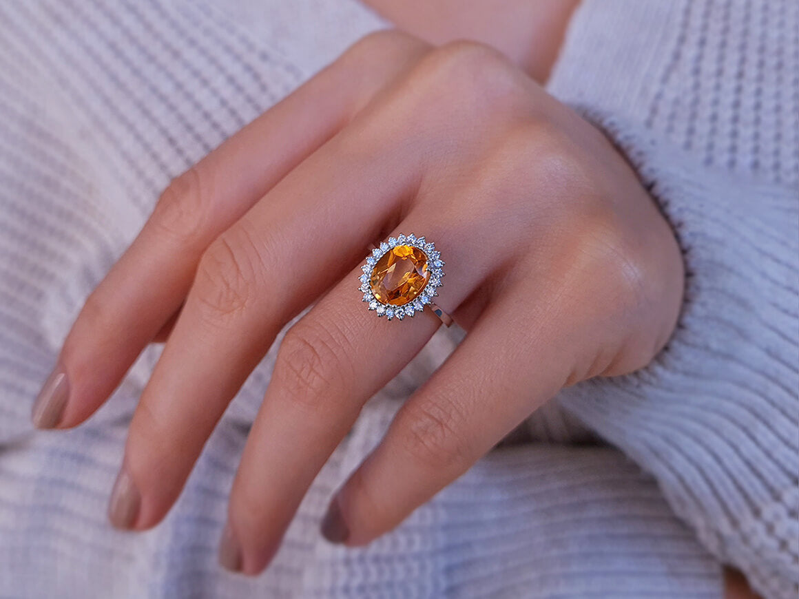 Diamond and oval citrine ring in 14 carat white gold