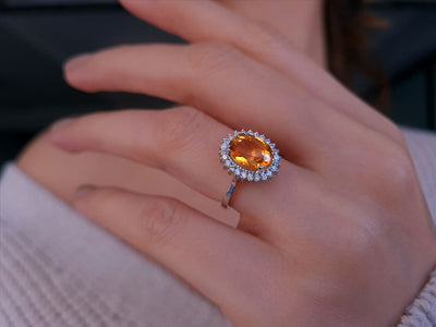 Diamond and oval citrine ring in 14 carat white gold