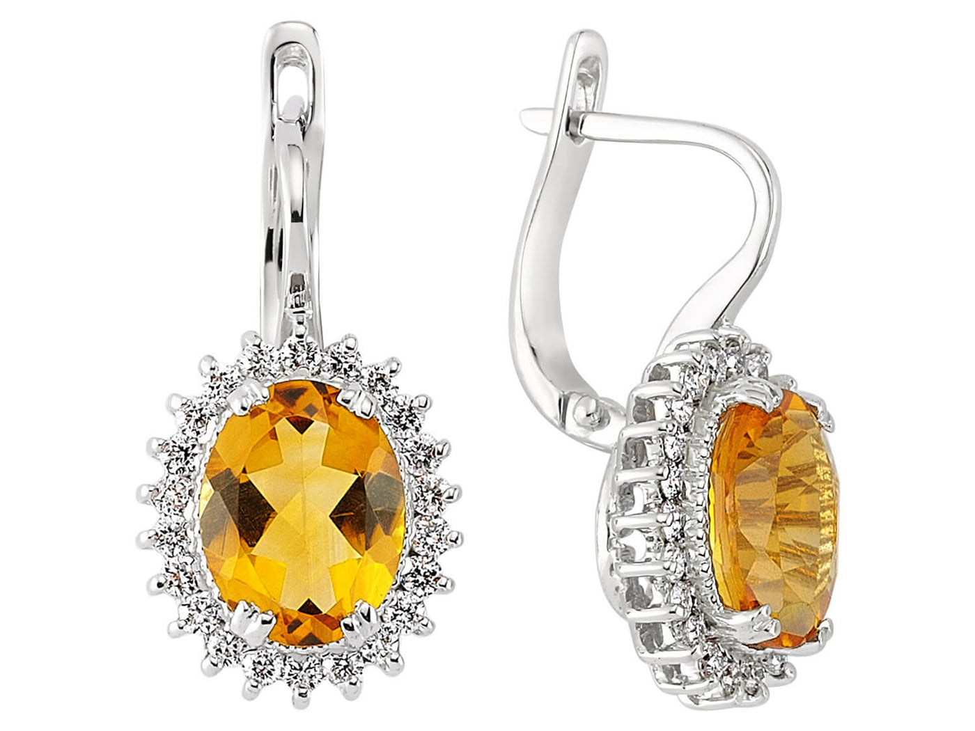 Diamond and oval citrine earrings in 14 carat white gold