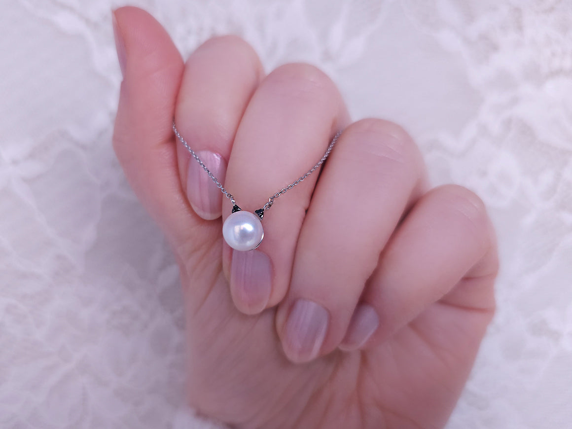 Perlenkette mit schwarzen Diamanten
