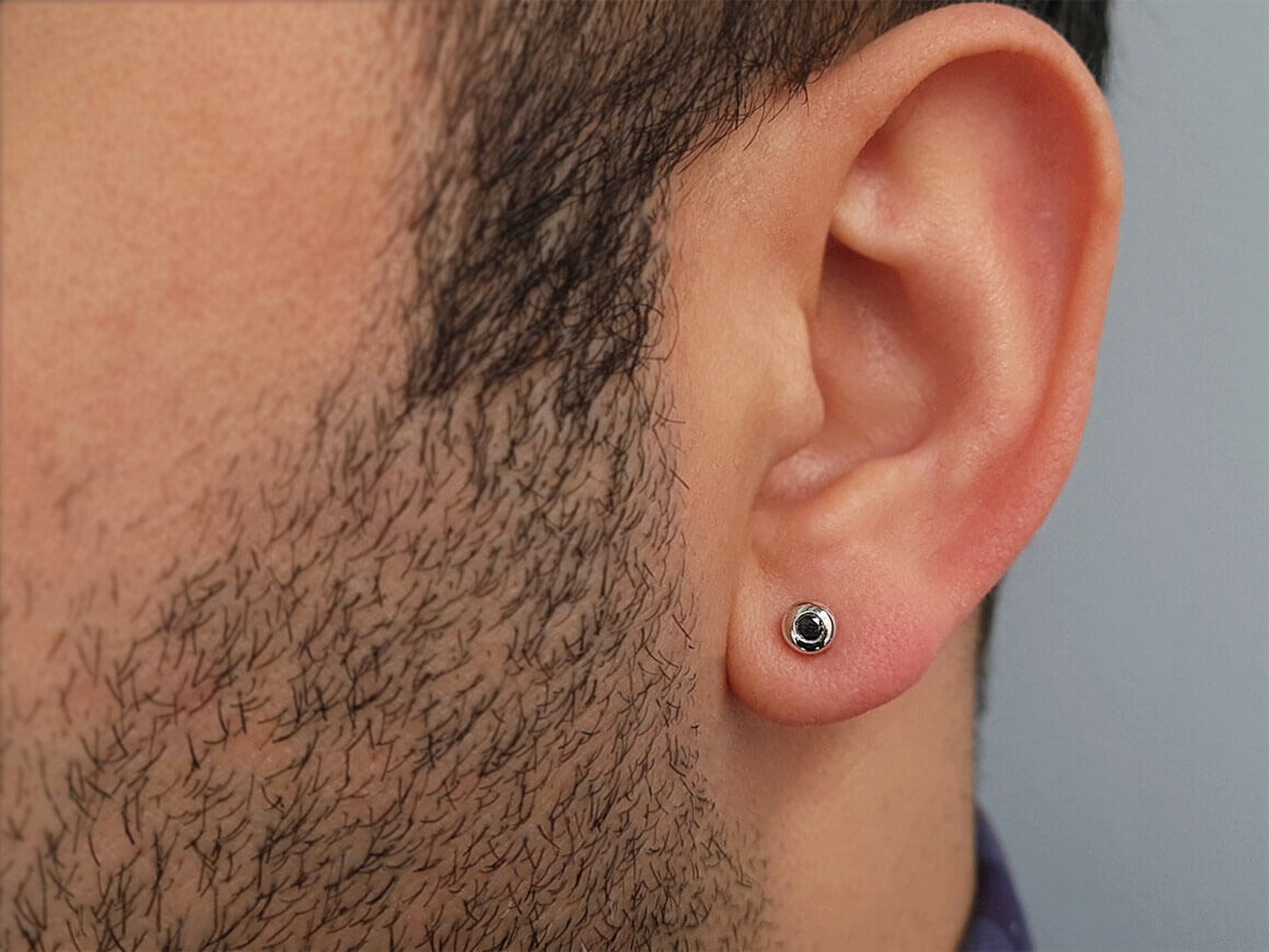 0.07 carat black diamond men's earring in 585 14 K white gold