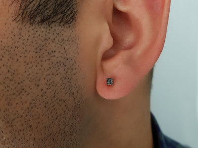 0.12 carat black diamond solitaire men's earring in 14K white gold