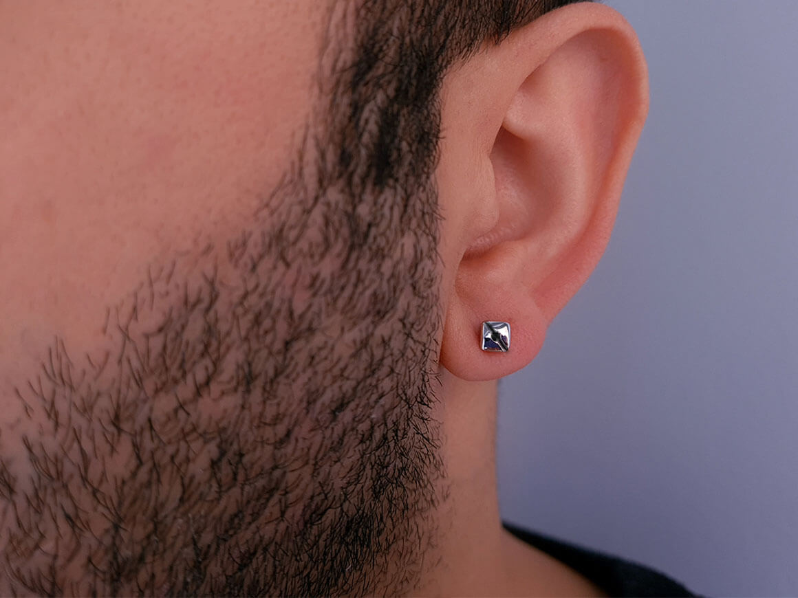 0.02 carat black diamond solitaire men's earring
