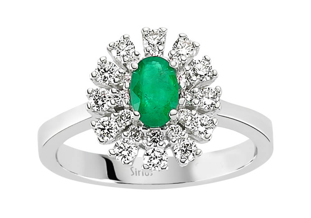 Diamond and oval emerald ring in 14 carat white gold