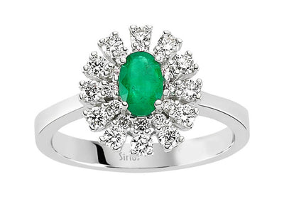 Diamond and oval emerald ring in 14 carat white gold