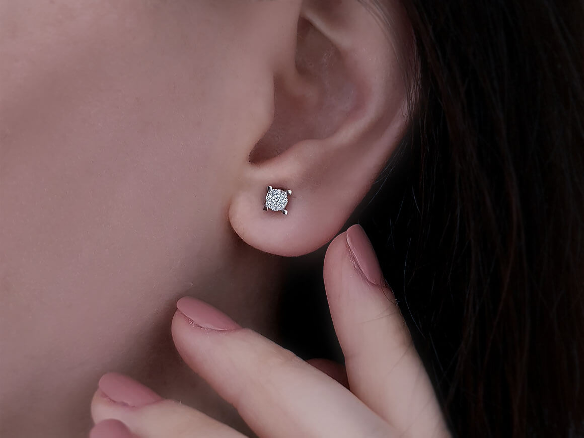 0,60 Carat Effekt 9 Diamanten Ohrstecker - handgefertigter Diamantschmuck aus Feingold | Sirius Diamant