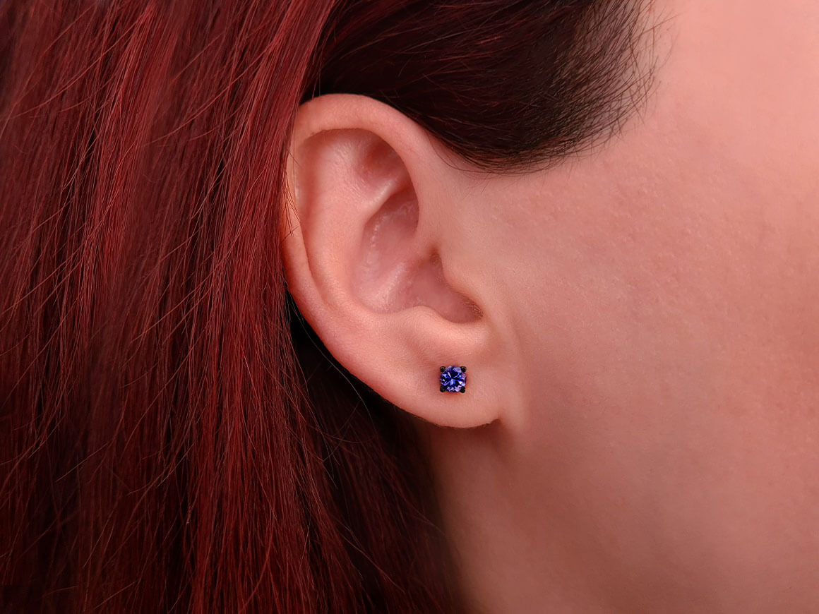 0.54 carat AAA Tanzanite solitaire earrings in 14k white gold