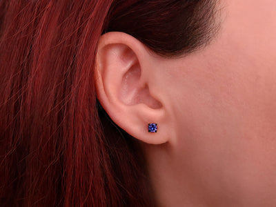 0.54 carat AAA Tanzanite solitaire earrings in 14k white gold