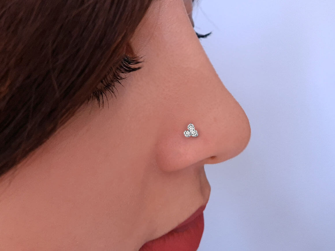 0.09 total carat diamond tria nose piercing in 14 K white gold - 7 mm x 4 mm