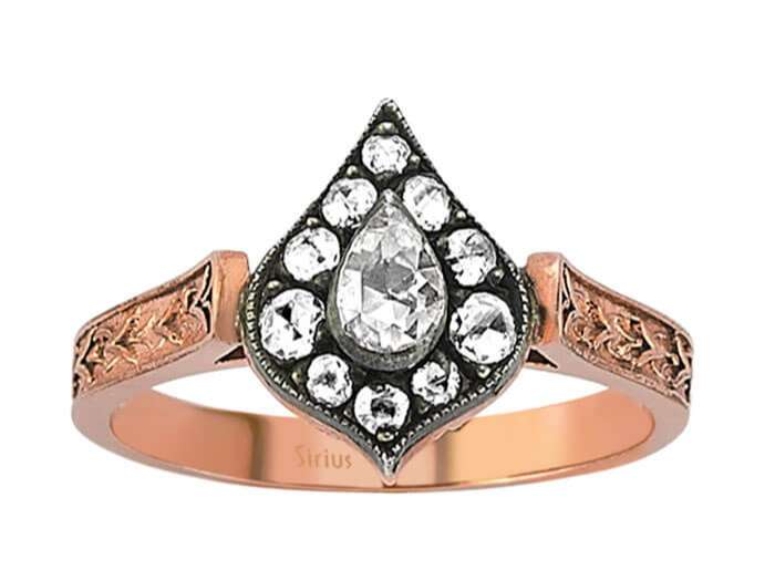 Diamond cut diamond ring in 8 carat red gold