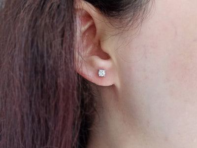 0.66 carat white topaz solitaire earrings