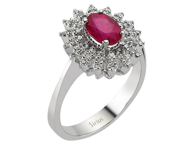 Diamond and oval ruby ring in 14 carat white gold