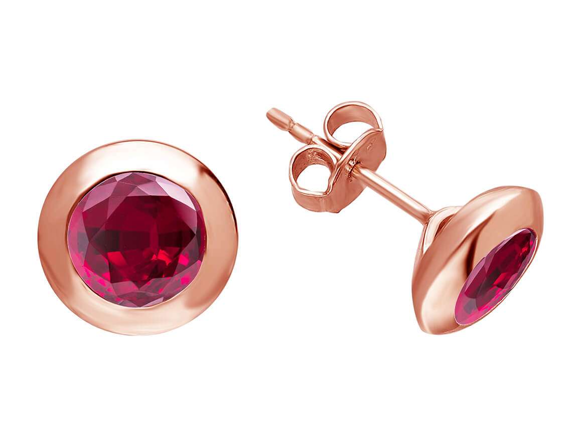 Solitaire earrings with ruby