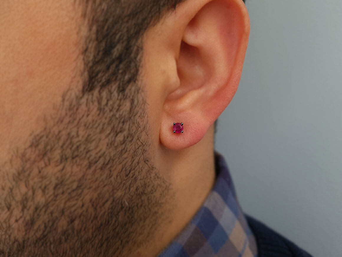 0.33 carat ruby solitaire men's earring in 14K white gold 