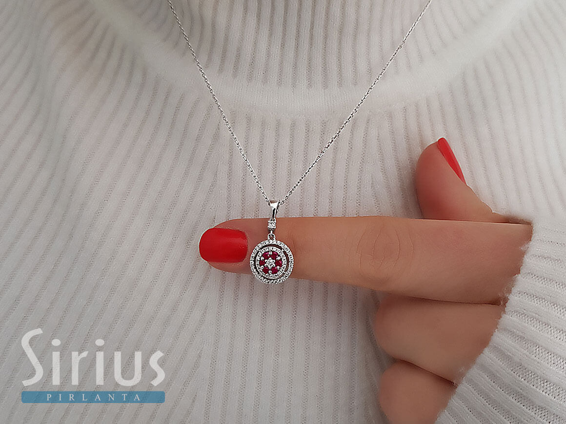 Two-row diamond and ruby flower necklace in 14 K white gold