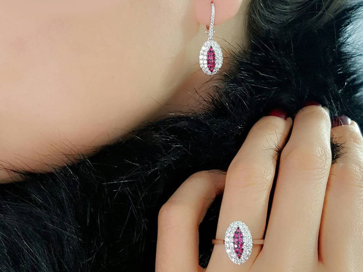 Earrings with rubies and double row diamonds