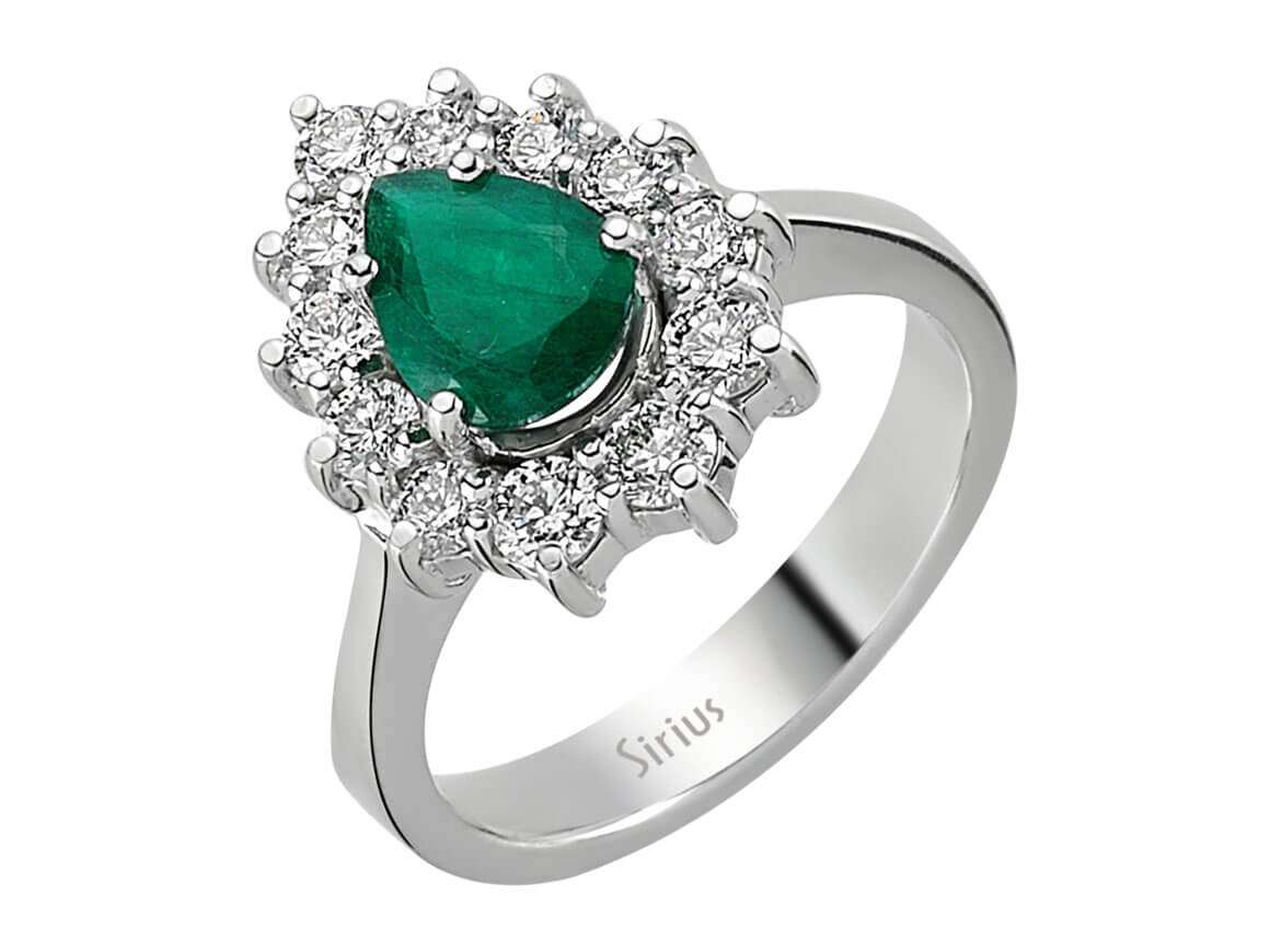 Diamond and drop emerald ring in 14 K white gold